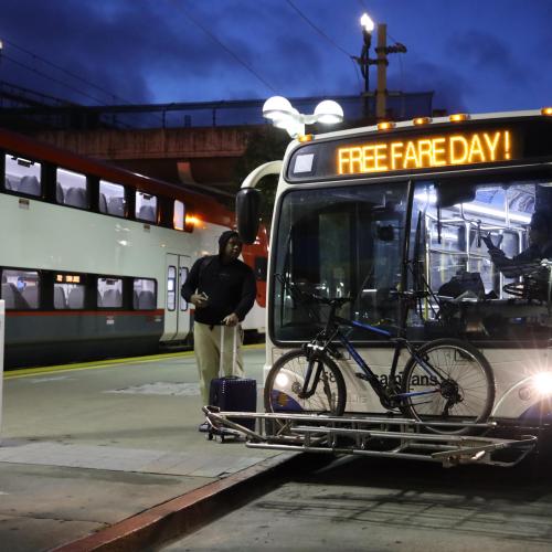 Rider embarking on bus on Rider Appreciation Day