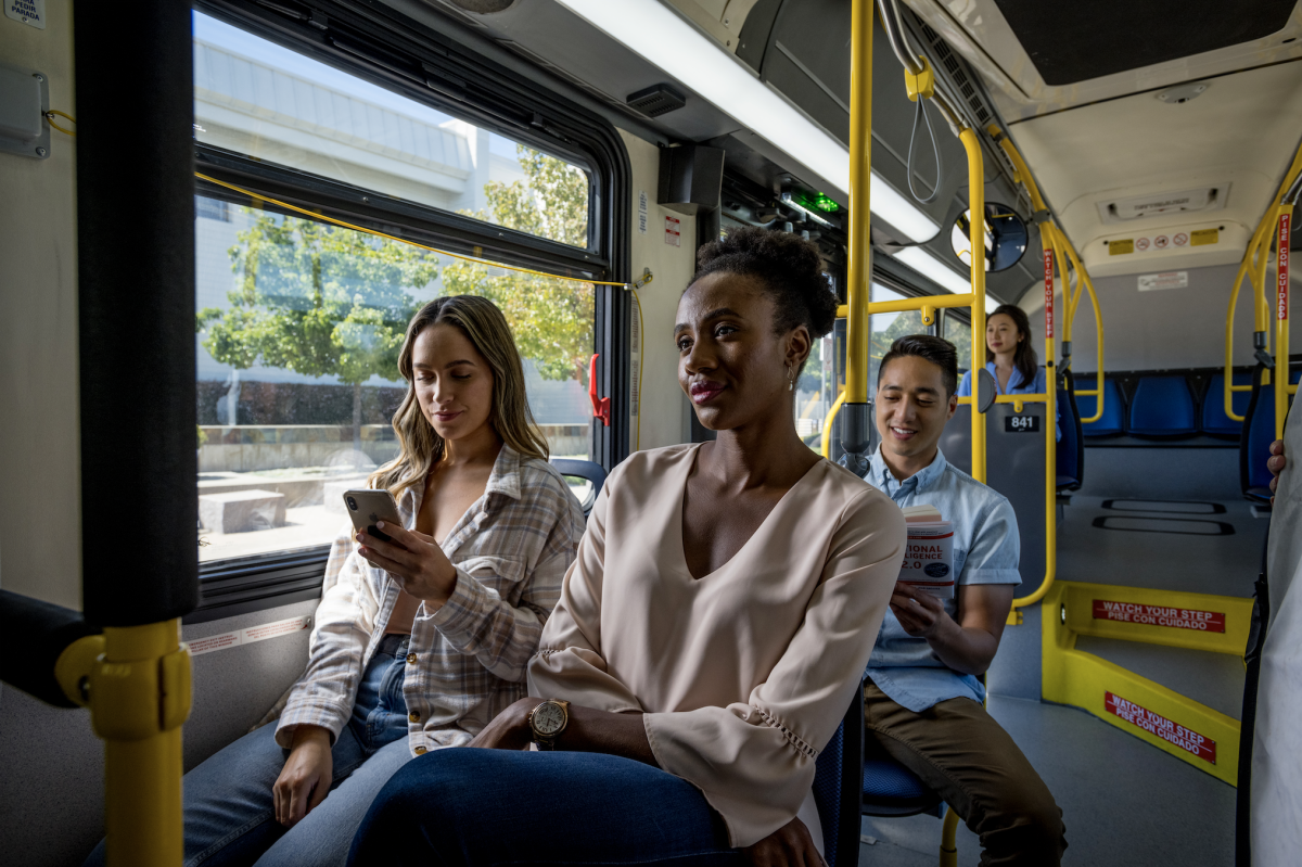 A few passengers riding a SamTrans bus.