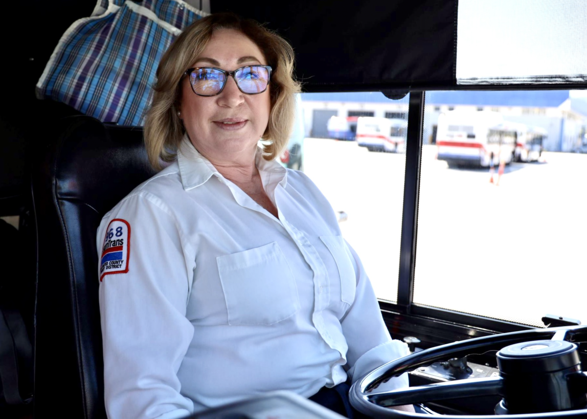 SamTrans Bus Operator Maria Gomez in the drivers seat.